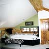 loft bathroom in log house